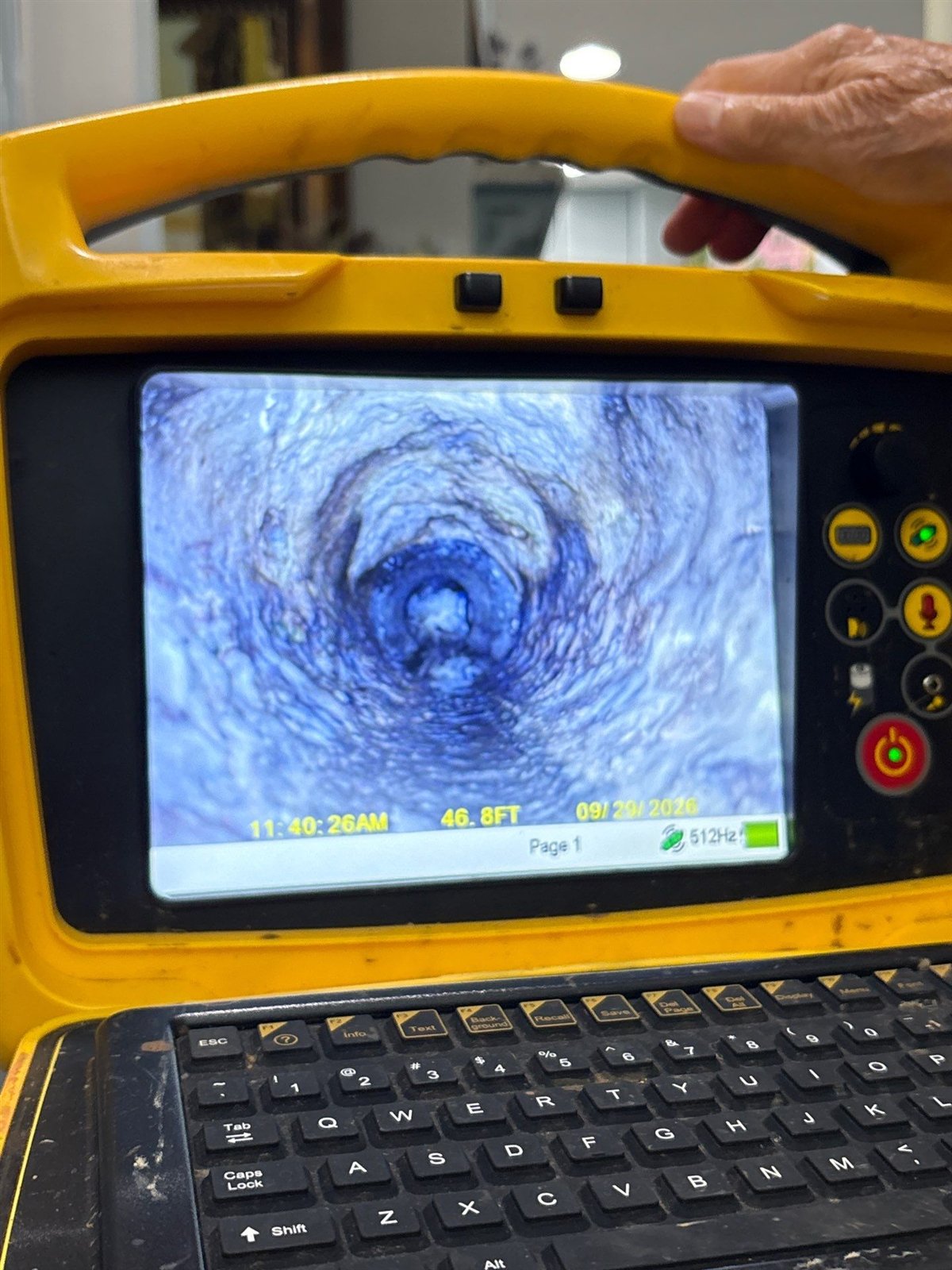 Sewer camera inspection monitor showing the inside of an older home's sewer line at 46.8 feet from the access point