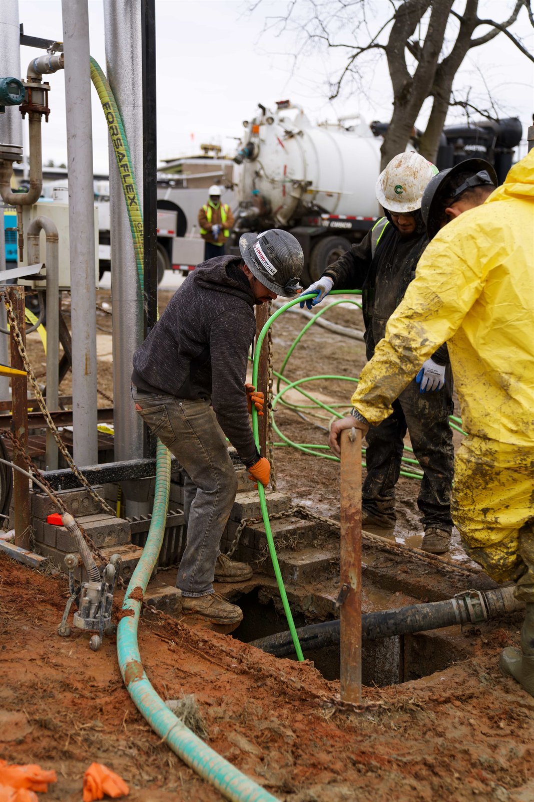 LiningWorks crew running a large scale sewer lining installation.