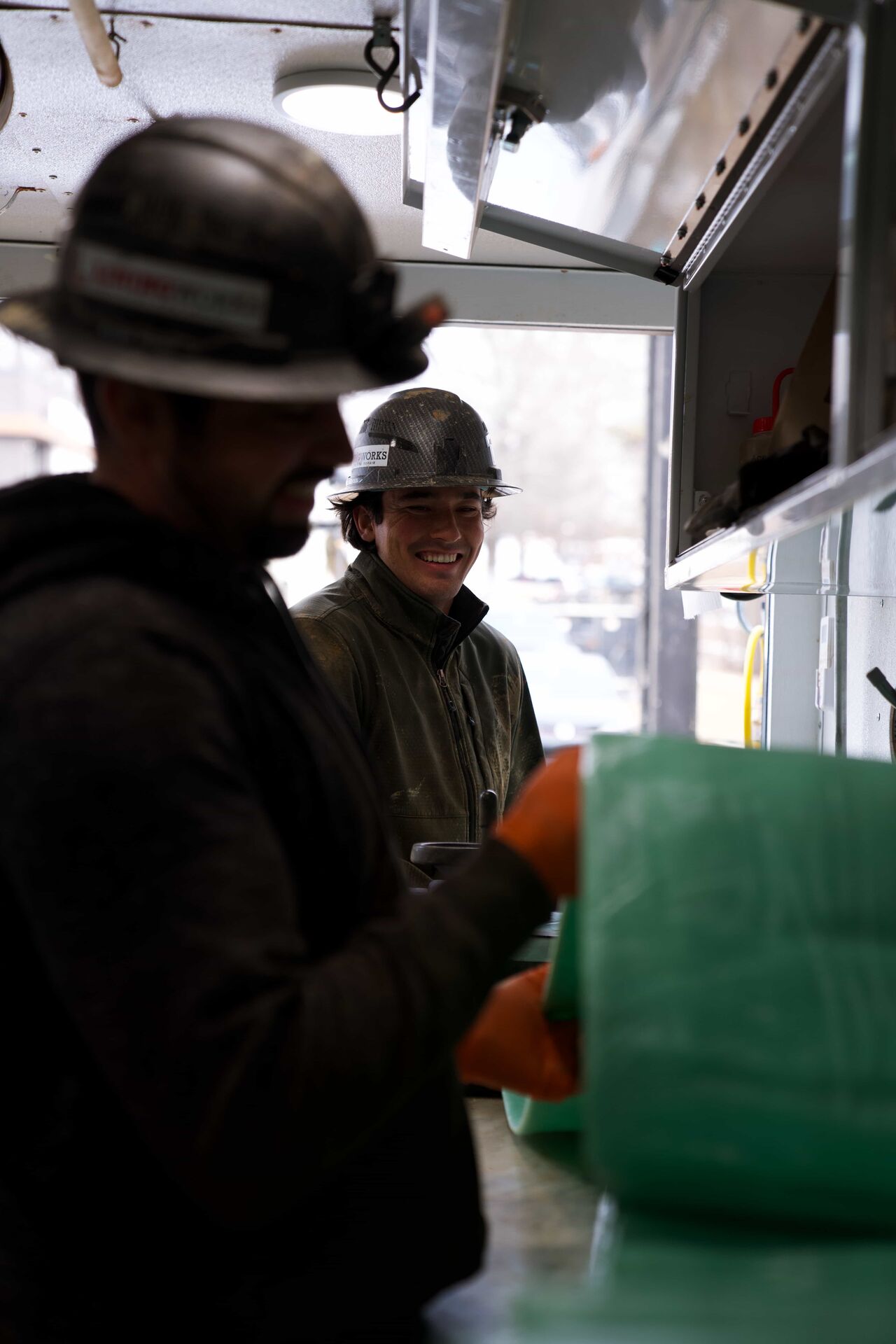 LiningWorks crew by their service truck