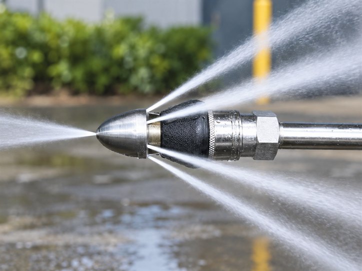 High-pressure hydro jetting nozzle used by LiningWorks to scour a sewer line back to bare pipe wall.