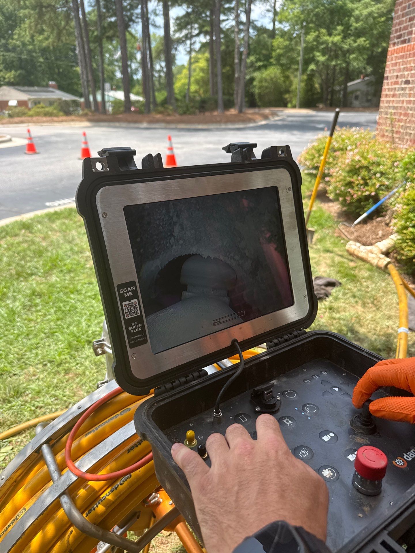 LiningWorks technician performing a sewer camera inspection to find pipe problems before they cause backups.