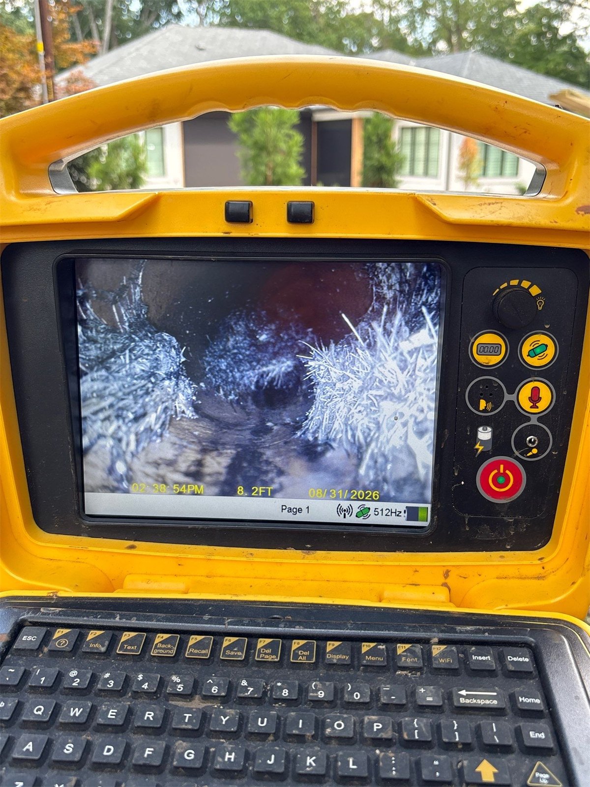 Sewer camera view of severe root intrusion inside a residential pipe: the type of defect CIPP Pipe Lining repairs without excavation.